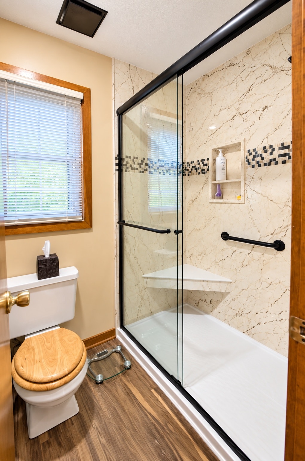 Modern bathroom with marble shower enclosure
