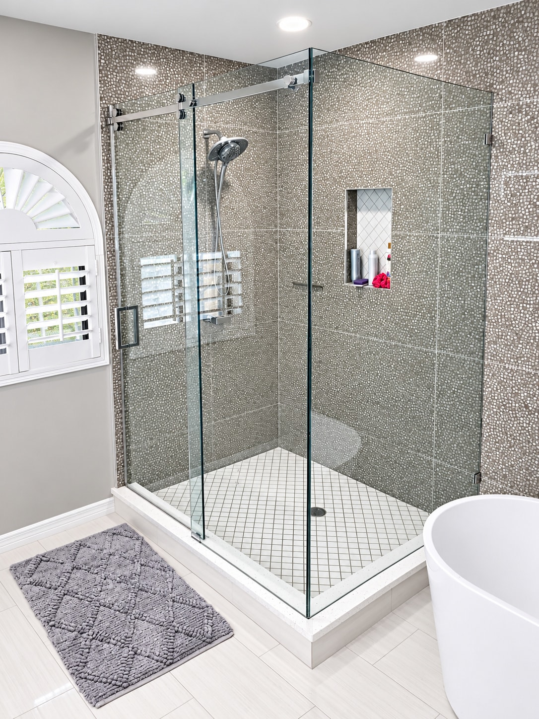 Modern bathroom with glass shower enclosure