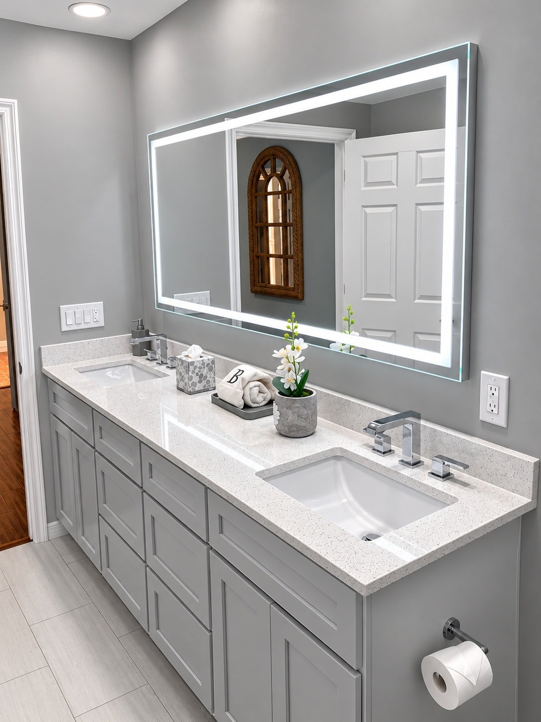 Modern bathroom vanity with lighted mirror