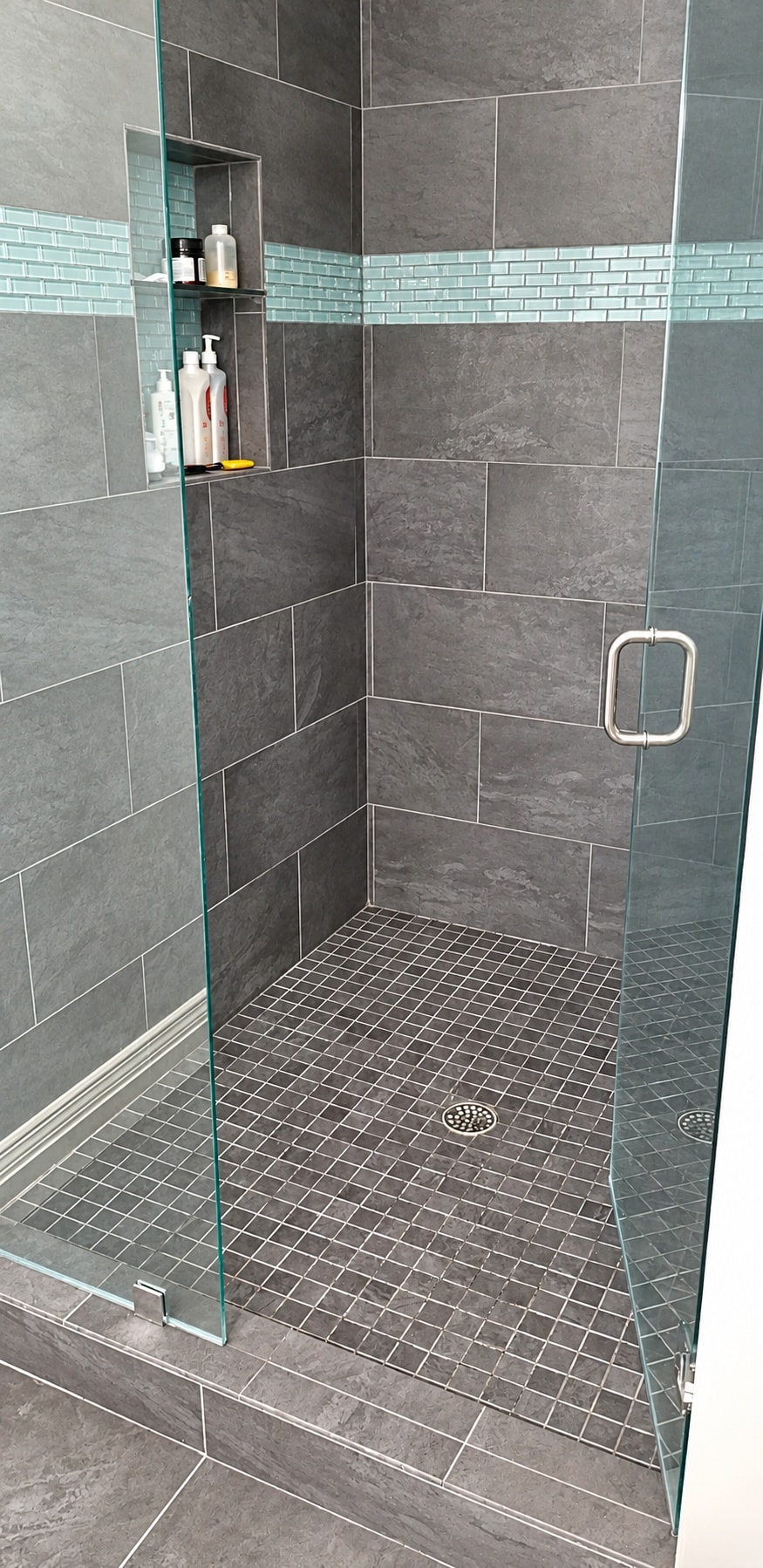 Modern bathroom shower with glass enclosure
