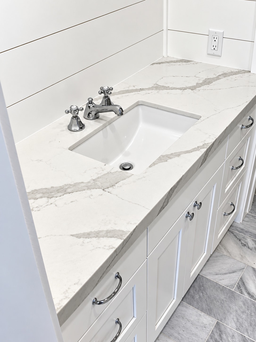 Marble bathroom vanity with sink faucet