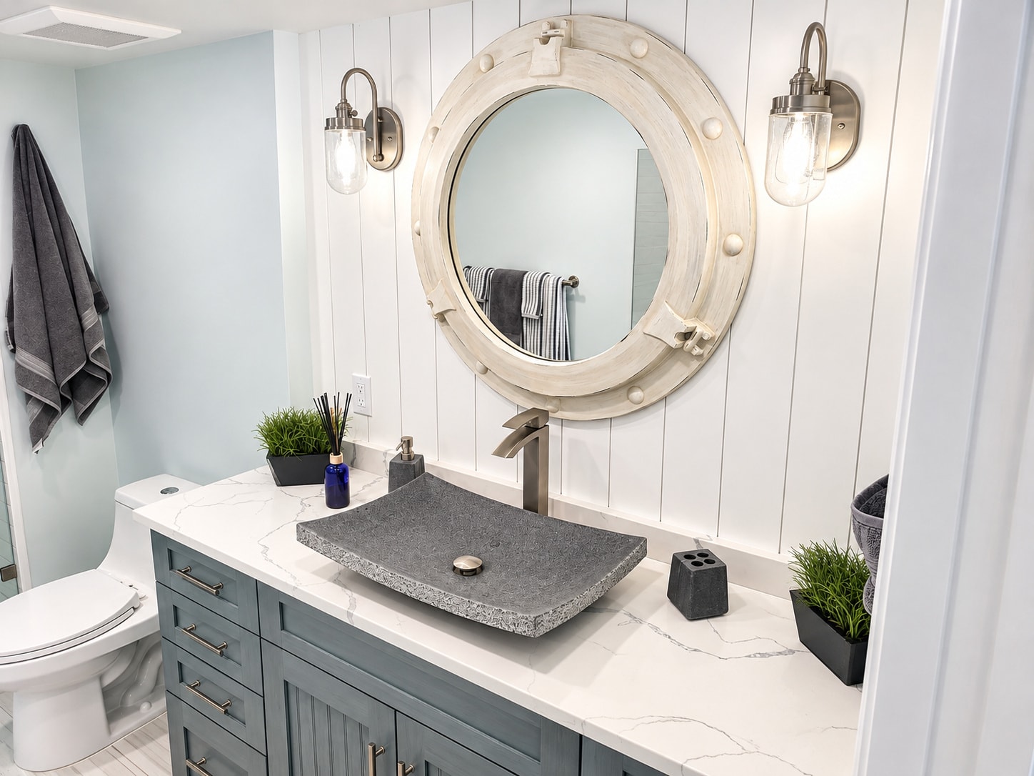 Modern bathroom vanity with porthole mirror