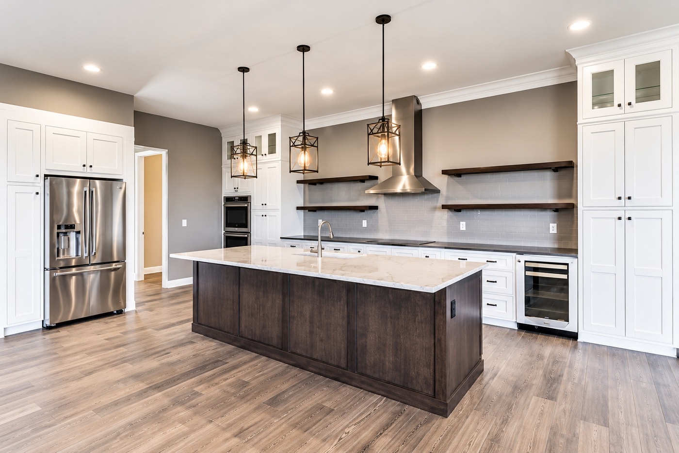 Modern kitchen with dark island and open shelving