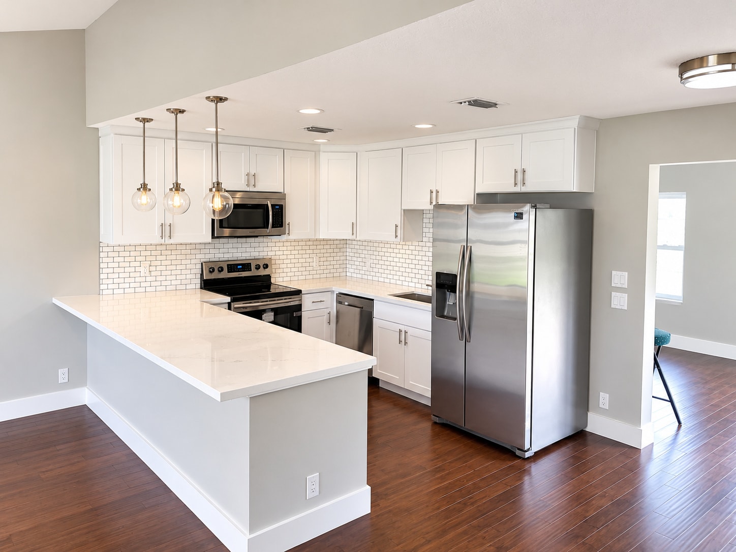 Modern kitchen white cabinets stainless appliances