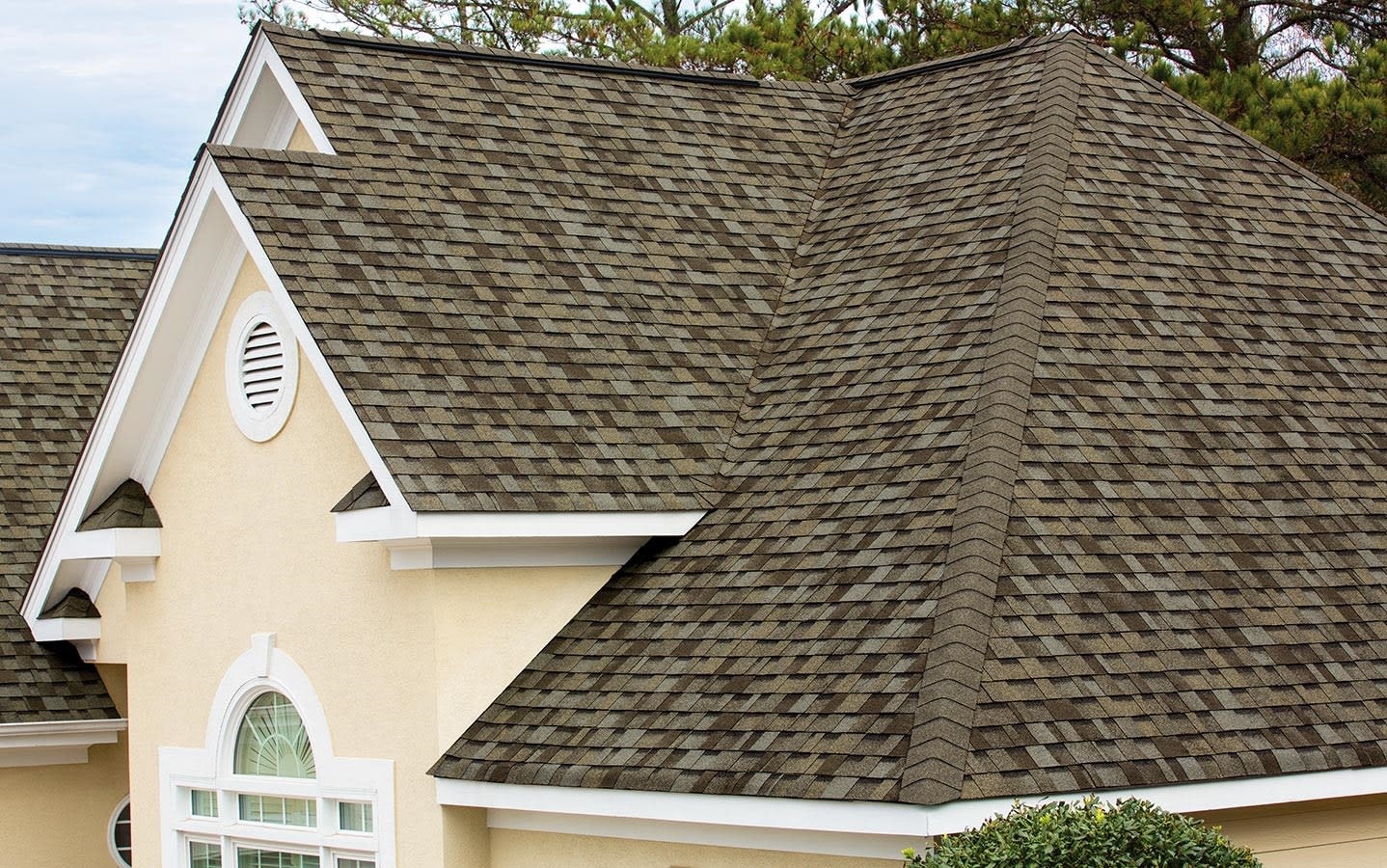 Close-up of dimensional shingle roof with gable dormers
